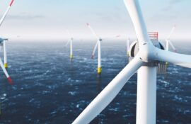 Offshore Wind Power And Energy Farm With Many Wind Turbines On The Ocean